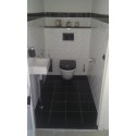 Klassiek toilet met metro tegels in zwart wit